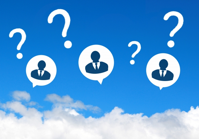 疑問を浮かべるサラリーマンの画像